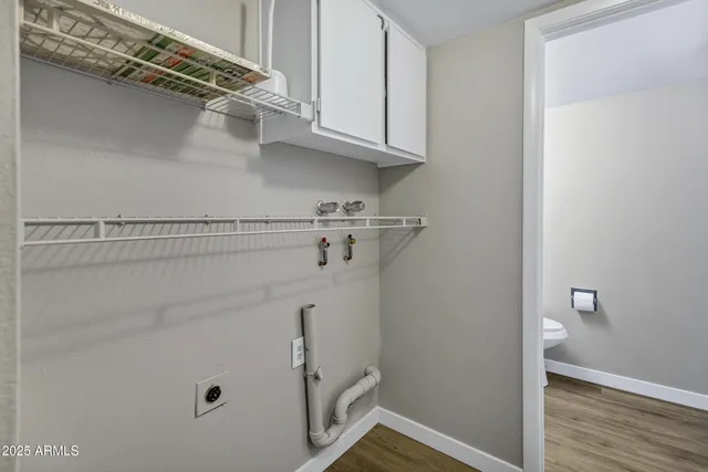 a view of small space with racks on the wall