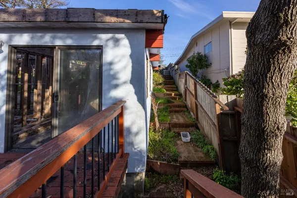 a view of a patio with a large window