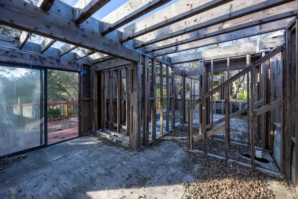 a view of an room with wooden walls