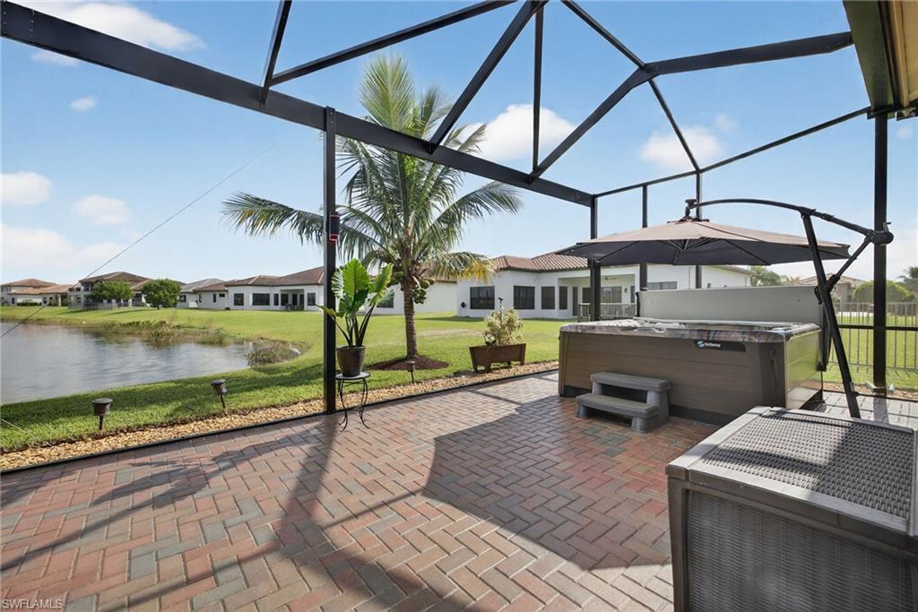 5102 Genoa Street Immokalee, FL 34142 - Photo 29 of 36 a view of a swimming pool with a patio