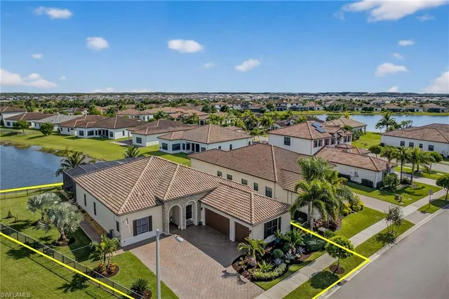 an aerial view of a house with a outdoor space