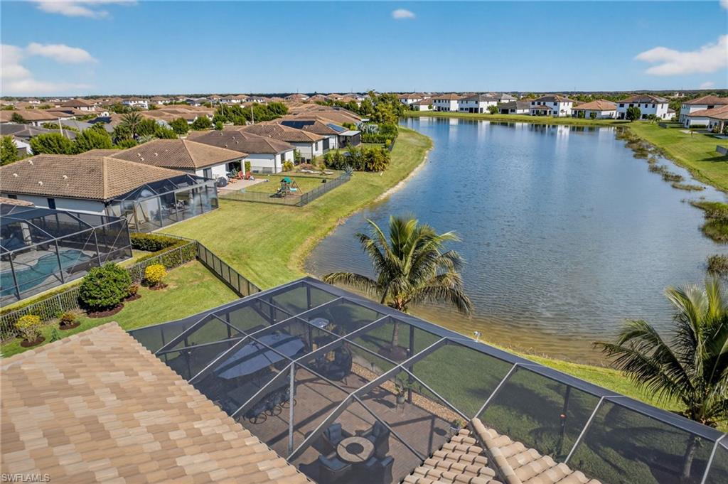 5102 Genoa Street Immokalee, FL 34142 - Photo 35 of 36 an aerial view of a house with a lake view