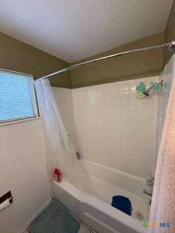 a view of a closet with storage