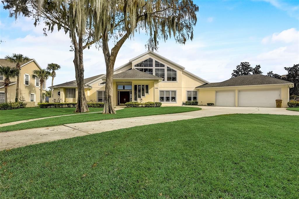 Stunning over 5,000 sq. ft. home located in the gated golf community of Kissimmee Bay with views of East Lake Toho