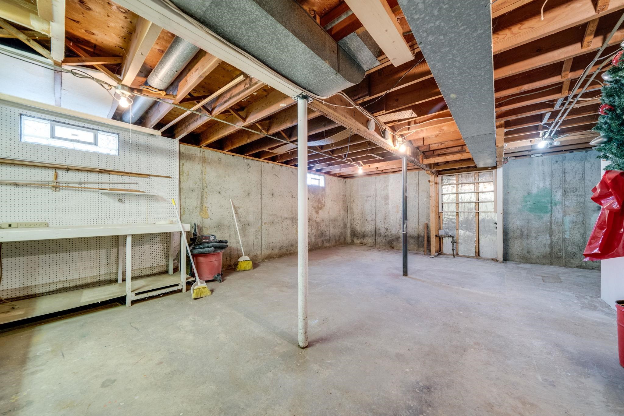 1611 Notre Dame Road Rockford, IL 61103 - Photo 25 of 33 a view of a room with wooden walls