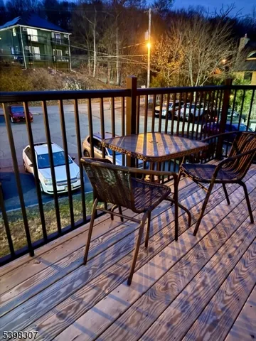 a view of a chairs on the deck