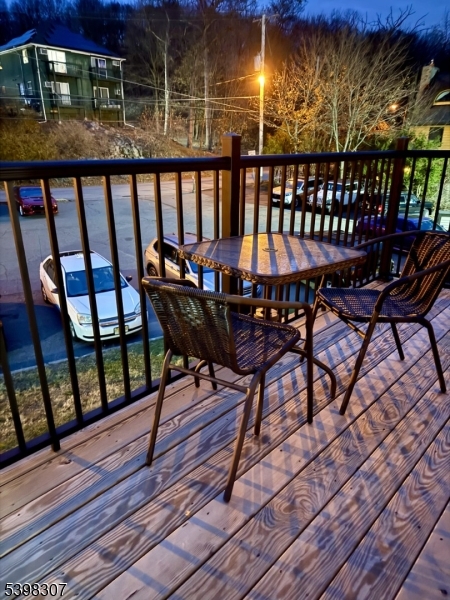 469 River Styx Road, Unit 25 Hopatcong, NJ 07843 - Photo 8 of 8 a view of a chairs on the deck