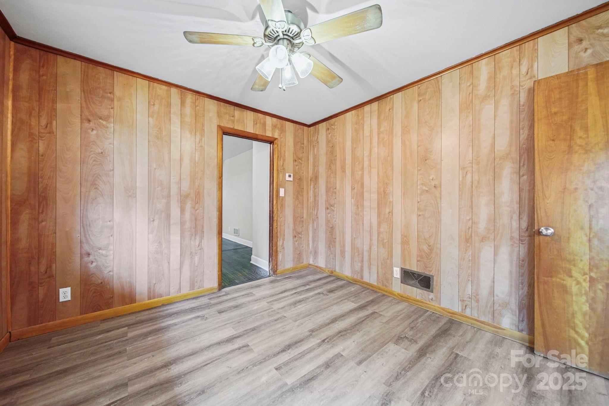1331 Stegall Road Marshville, NC 28103 - Photo 13 of 35 a view of a big room with chandelier fan and windows