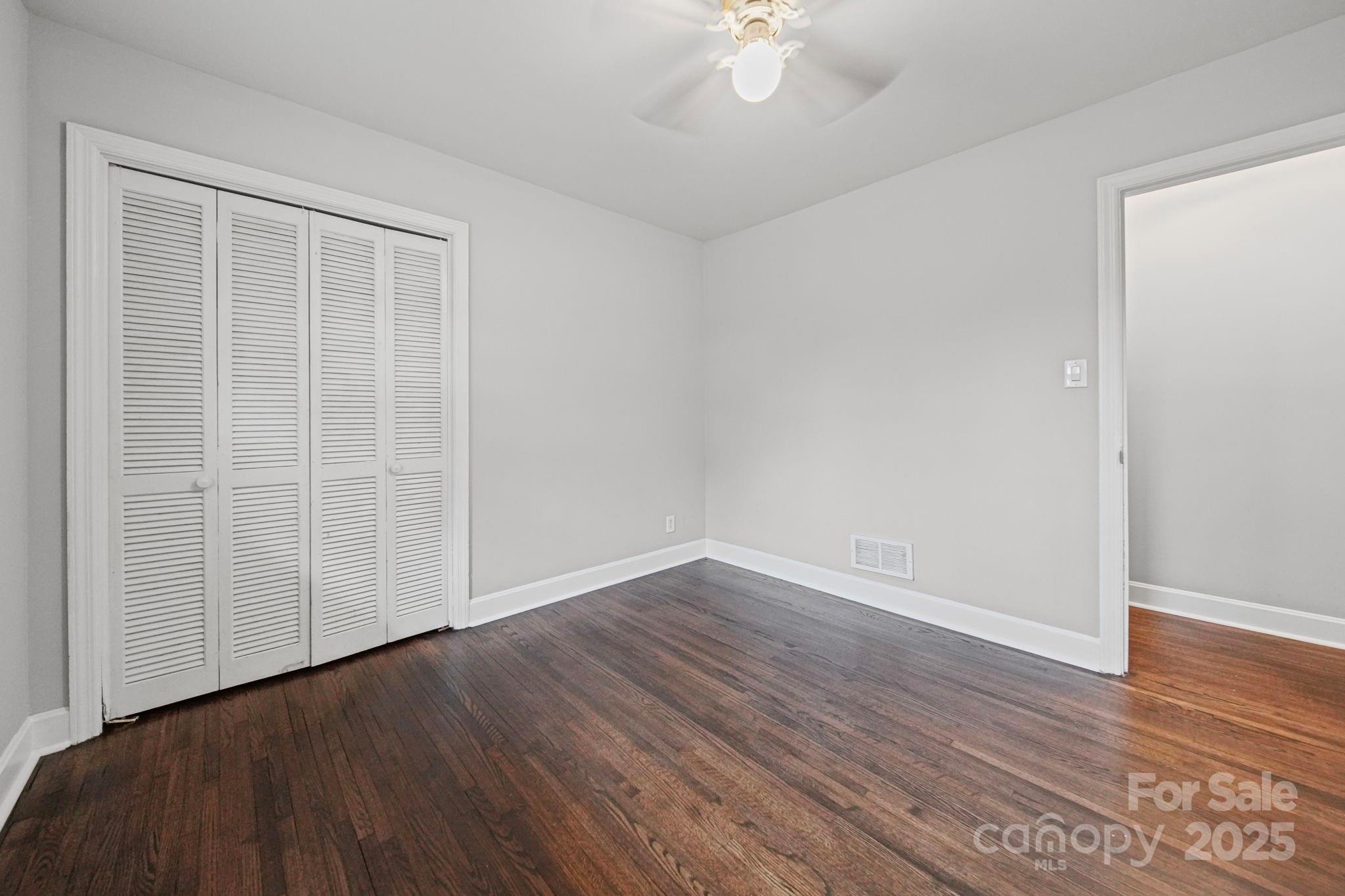 1331 Stegall Road Marshville, NC 28103 - Photo 22 of 35 a view of an empty room with wooden floor