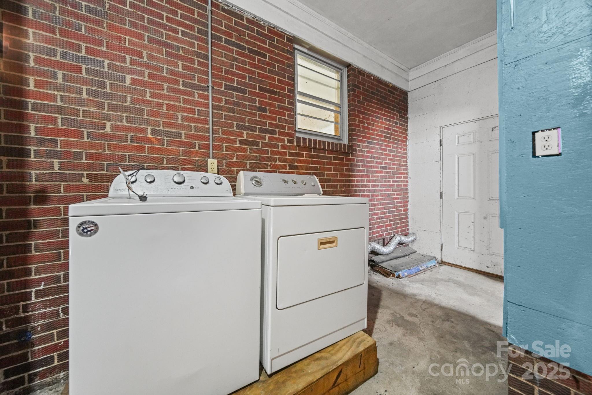 1331 Stegall Road Marshville, NC 28103 - Photo 26 of 35 a utility room with dryer and washer