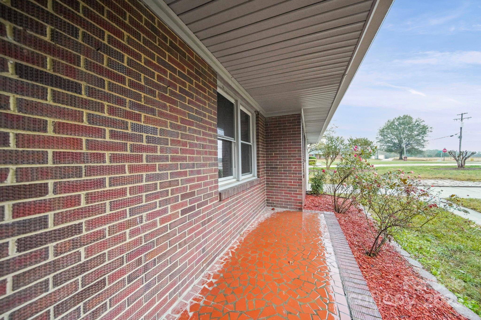 1331 Stegall Road Marshville, NC 28103 - Photo 28 of 35 a view of a backyard with plants and garden