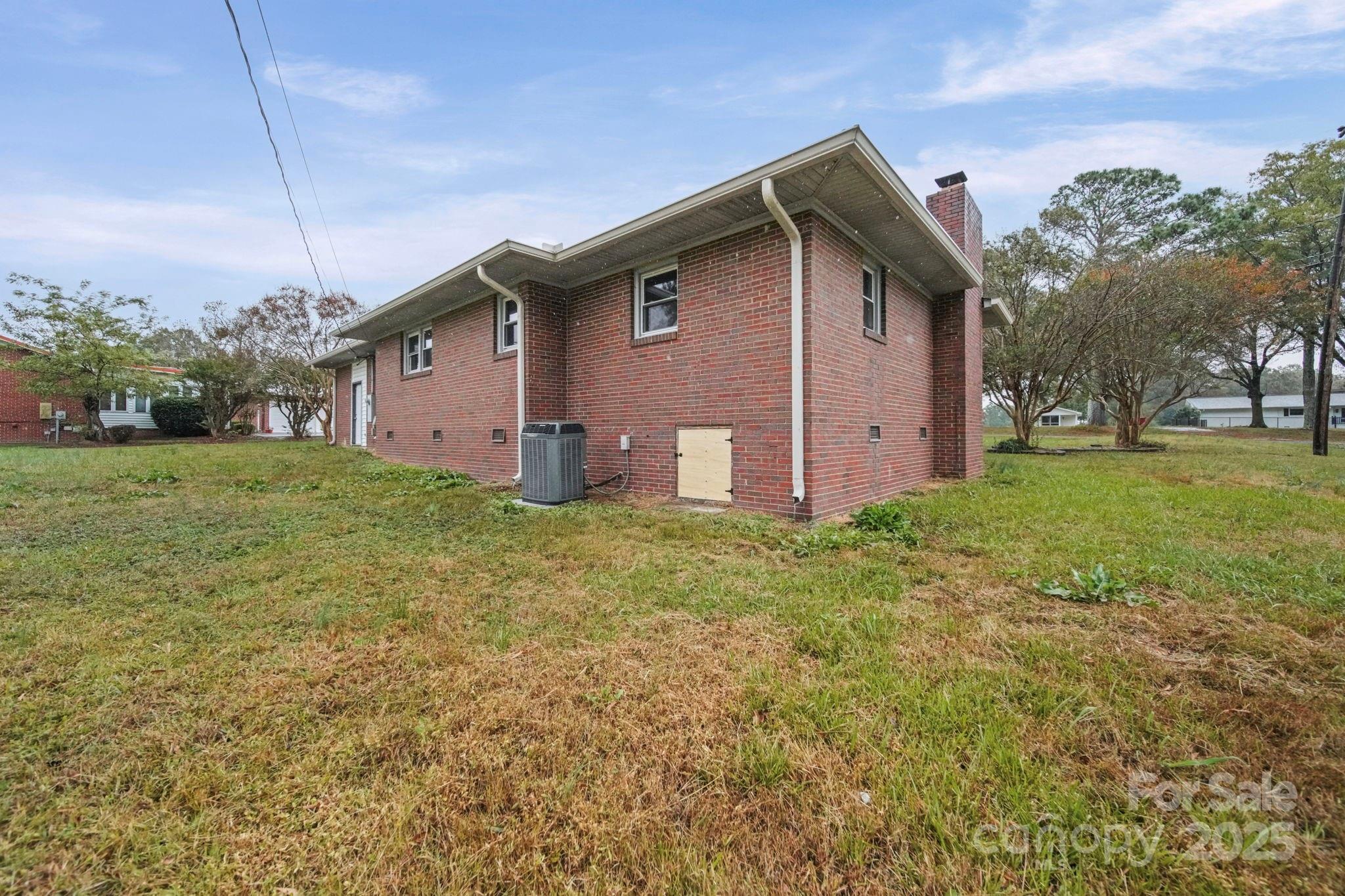 1331 Stegall Road Marshville, NC 28103 - Photo 30 of 35 a front view of house with yard and trees in the background