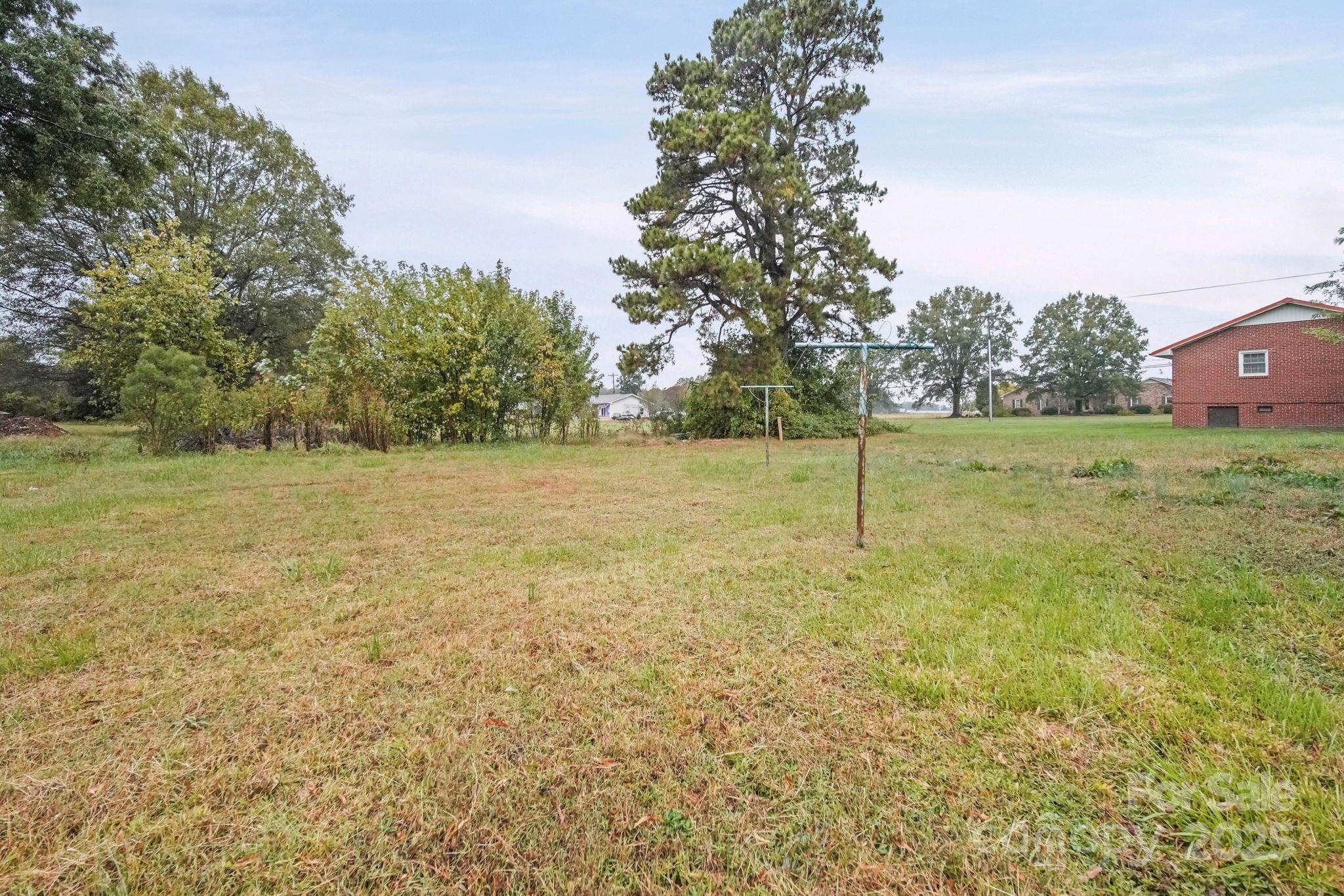 1331 Stegall Road Marshville, NC 28103 - Photo 31 of 35 a view of a field with trees