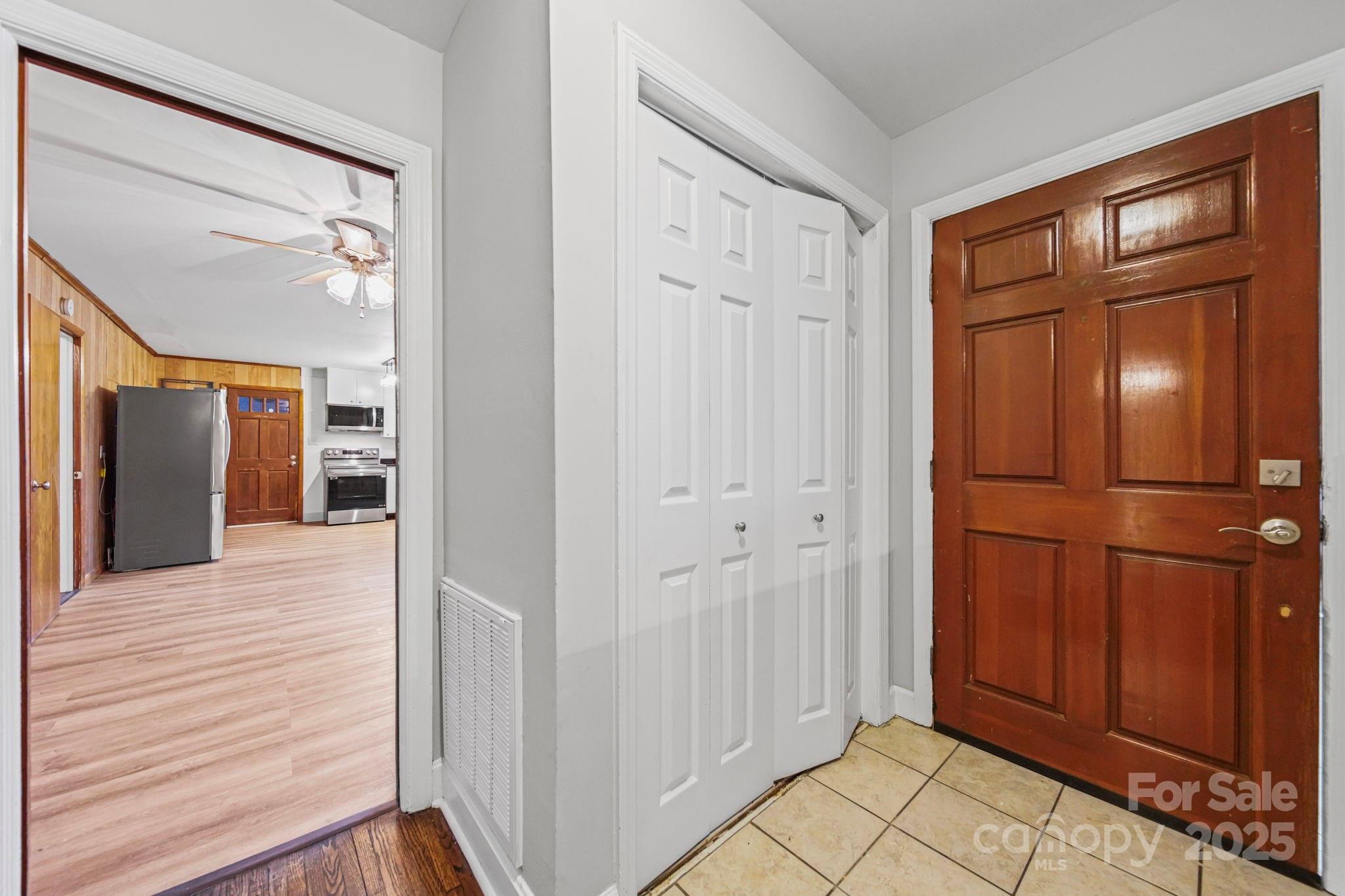 1331 Stegall Road Marshville, NC 28103 - Photo 6 of 35 a view of a hallway with wooden floor and cabinet