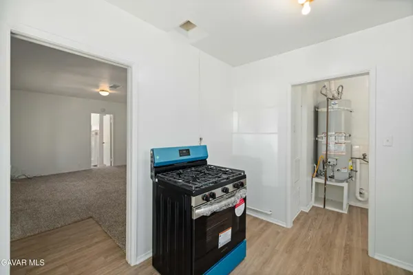 a room with a sink and a window