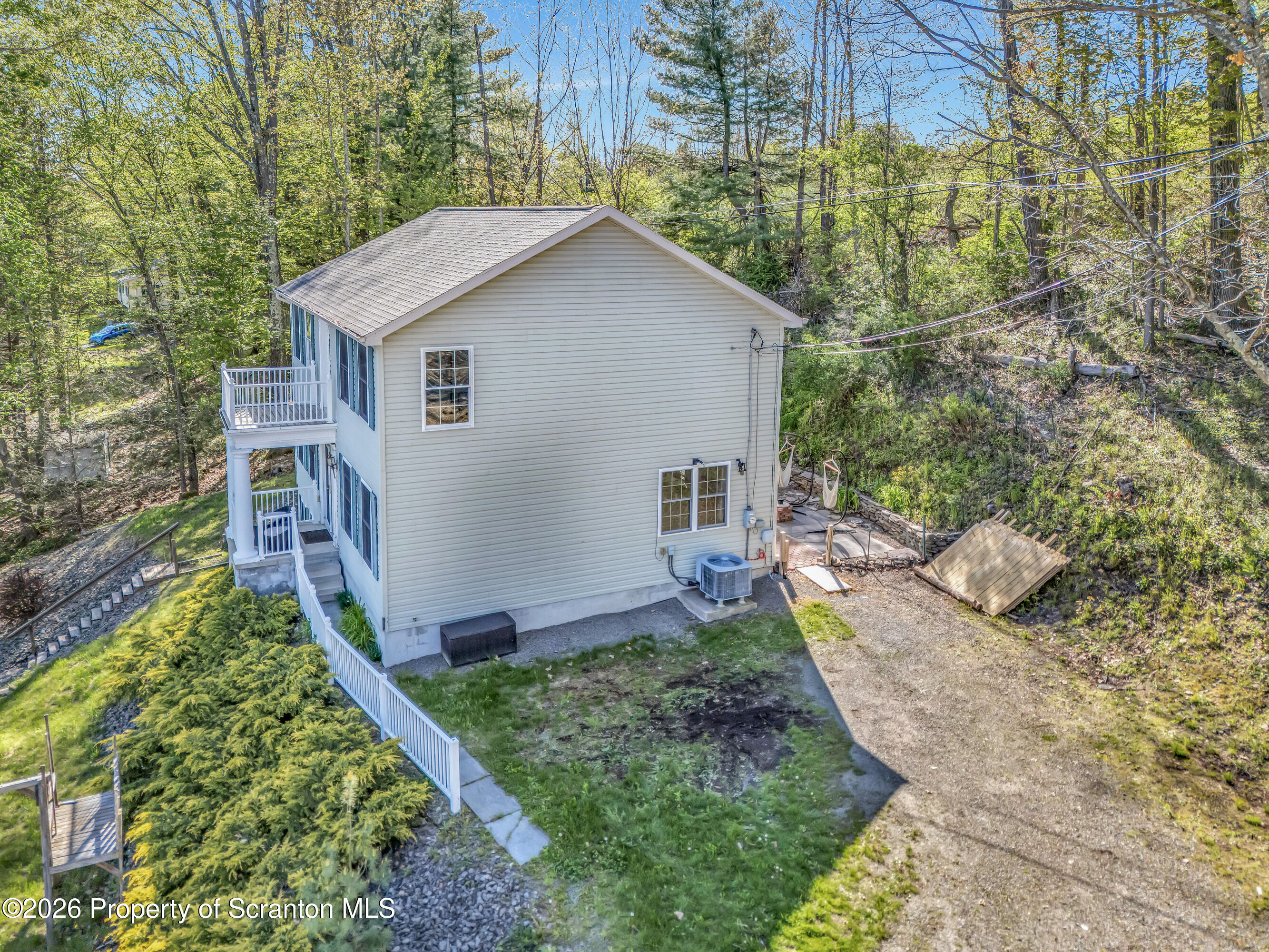155 Baylor Road Nicholson, PA 18446 - Photo 21 of 53 a view of an house with backyard space and garden