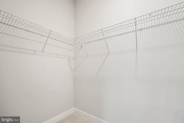 a view of a room with racks on the wall