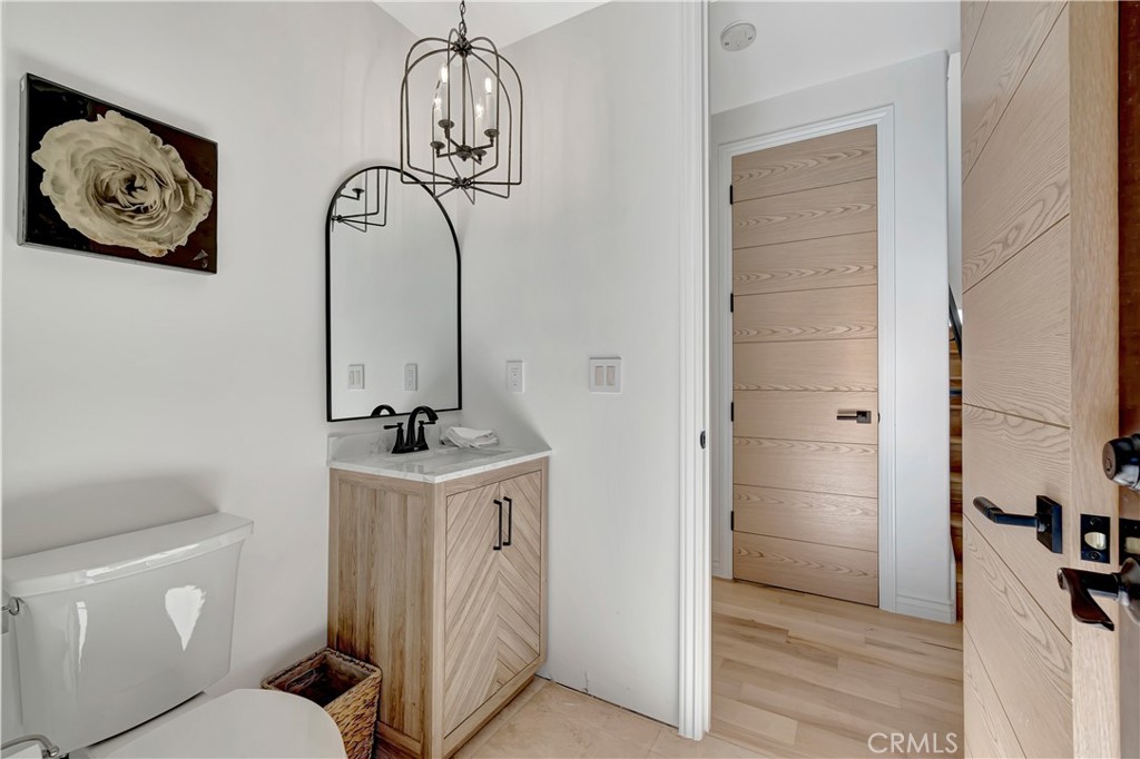 16 Eucalyptus Newport Coast, CA 92657 - Photo 20 of 38 a bathroom with a sink a toilet and shower