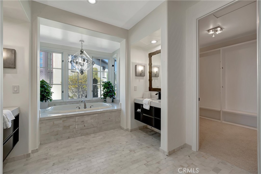 16 Eucalyptus Newport Coast, CA 92657 - Photo 31 of 38 a bathroom with a tub and a shower