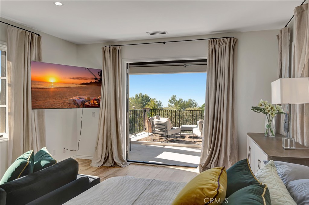 16 Eucalyptus Newport Coast, CA 92657 - Photo 34 of 38 a living room with furniture and a floor to ceiling window