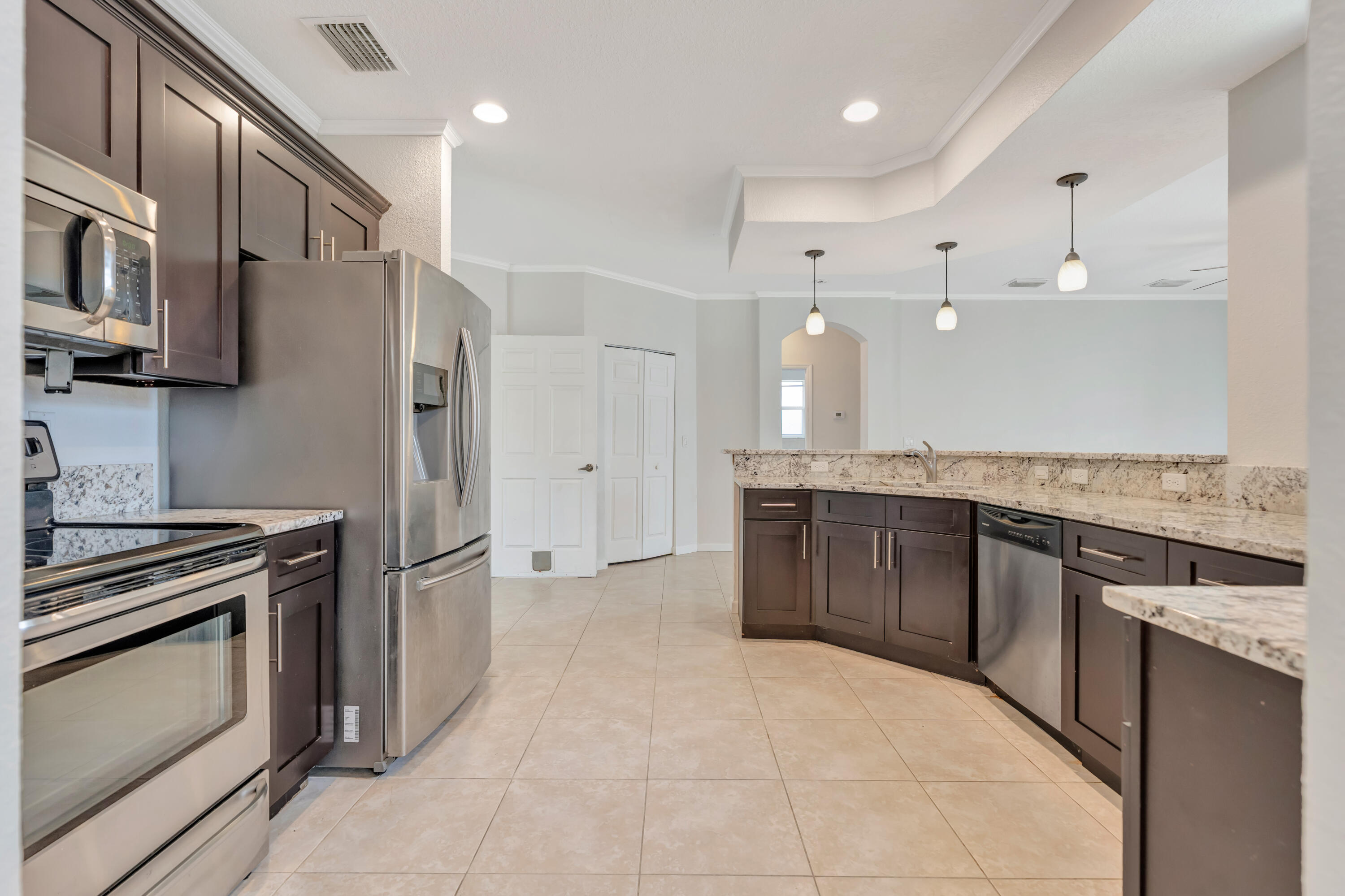2320 Southwest Madrid Road Port St. Lucie, FL 34953 - Photo 13 of 46 Kitchen