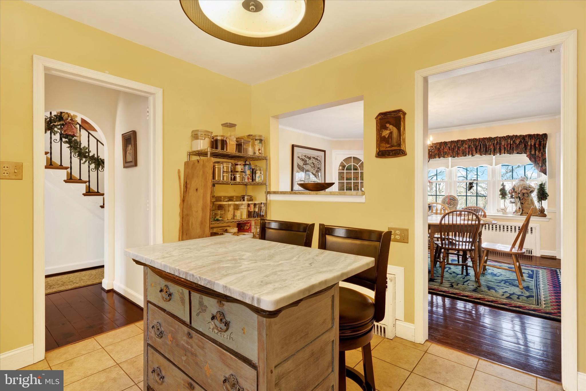 1711 Alsace Road Reading, PA 19604 - Photo 13 of 45 a view of kitchen island with furniture and wooden floor