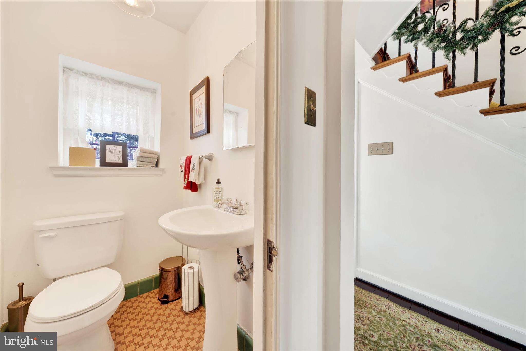 1711 Alsace Road Reading, PA 19604 - Photo 16 of 45 a bathroom with a sink toilet and a mirror