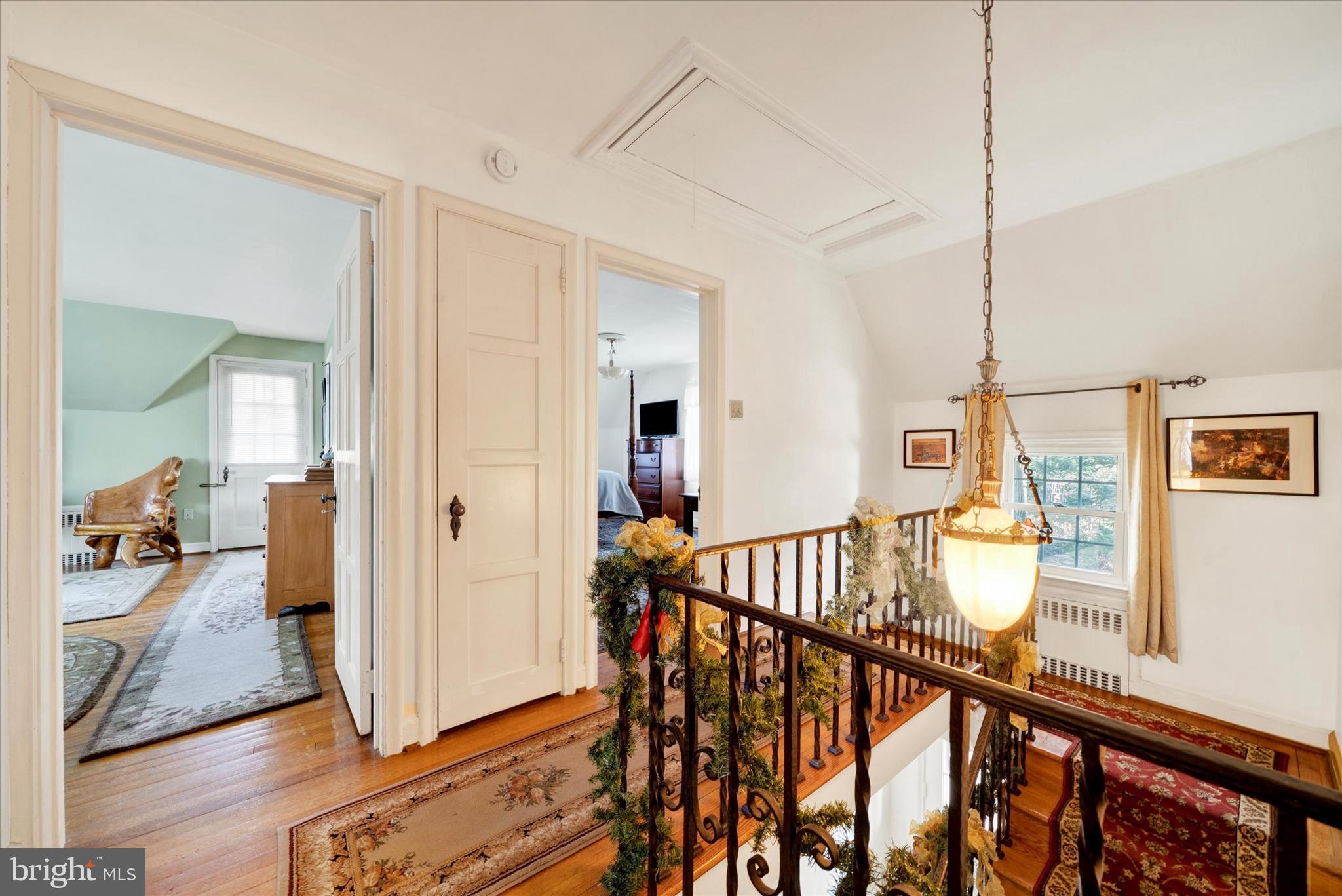 1711 Alsace Road Reading, PA 19604 - Photo 17 of 45 a view of a hallway with wooden floor and stairs