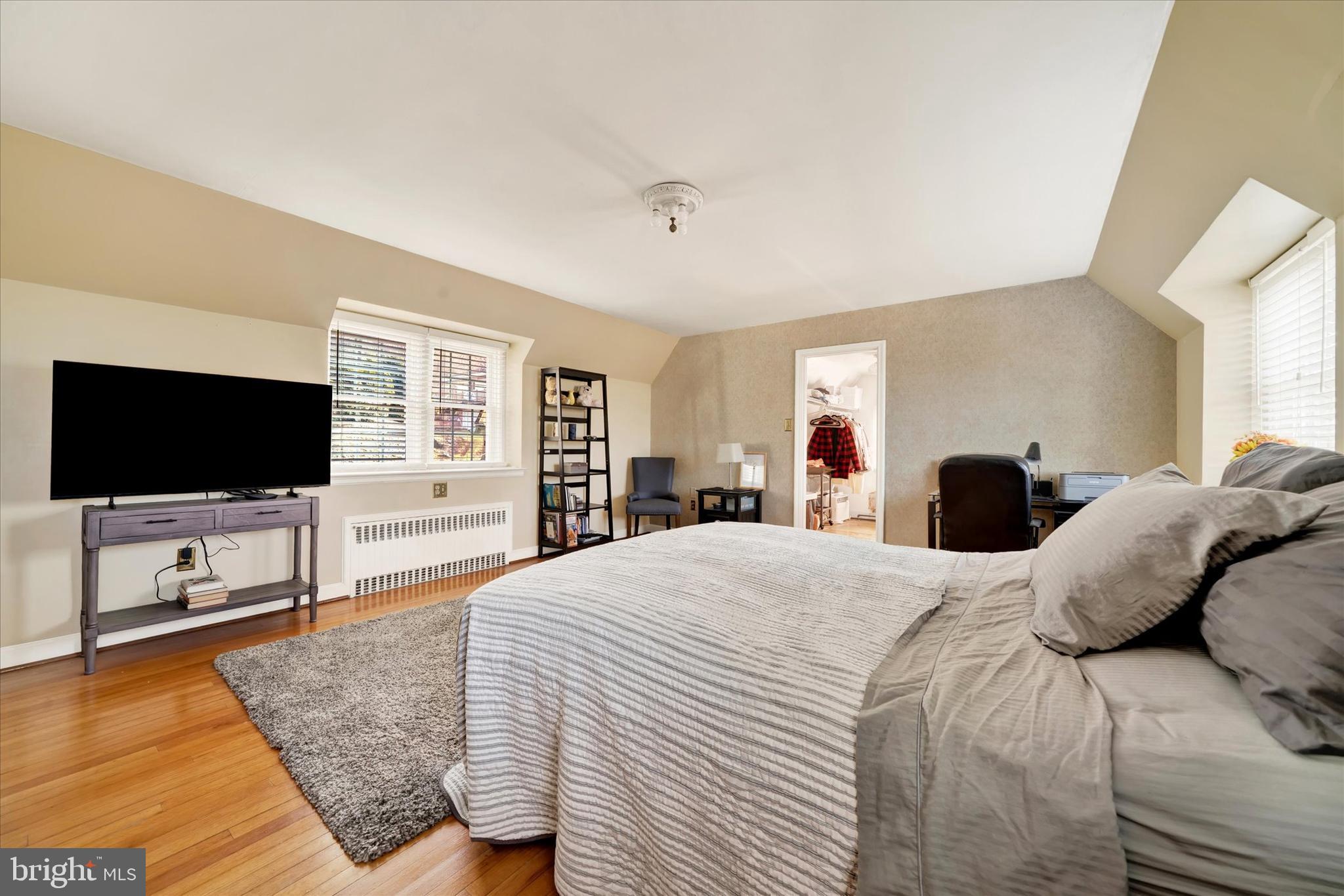 1711 Alsace Road Reading, PA 19604 - Photo 18 of 45 a bedroom with a bed and a flat screen tv