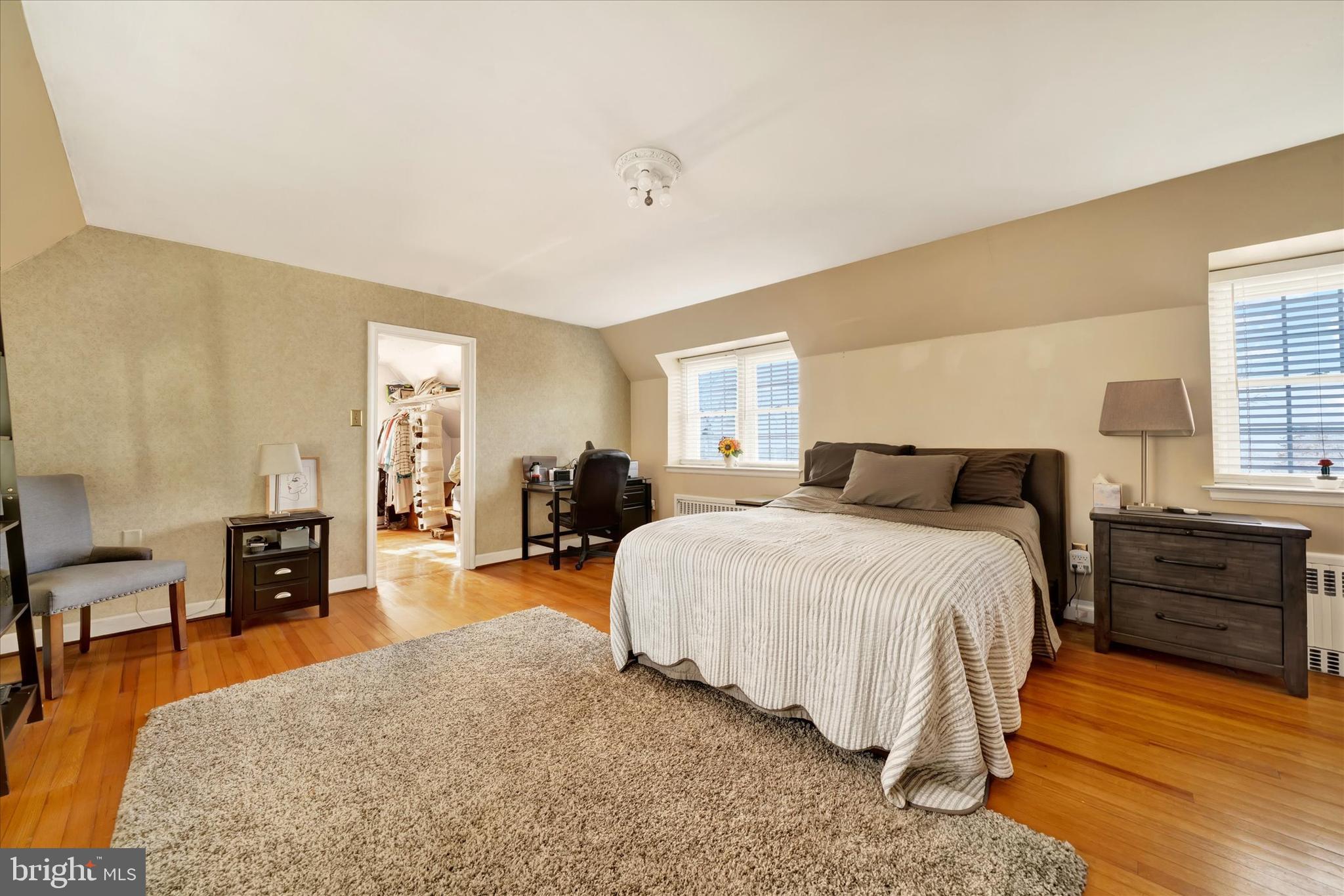 1711 Alsace Road Reading, PA 19604 - Photo 19 of 45 a spacious bedroom with a bed and wooden floor