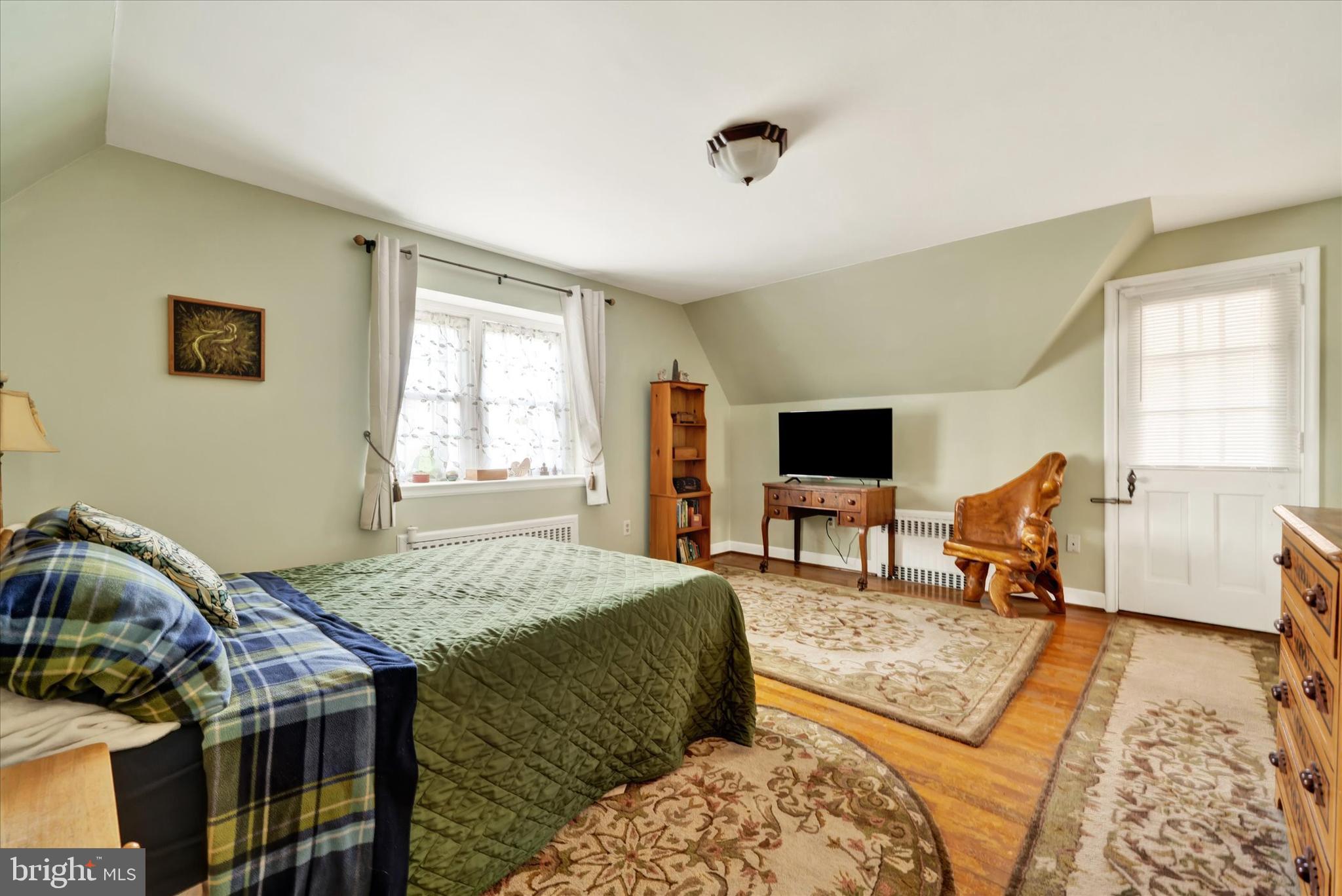 1711 Alsace Road Reading, PA 19604 - Photo 23 of 45 a living room with a bed and a couch
