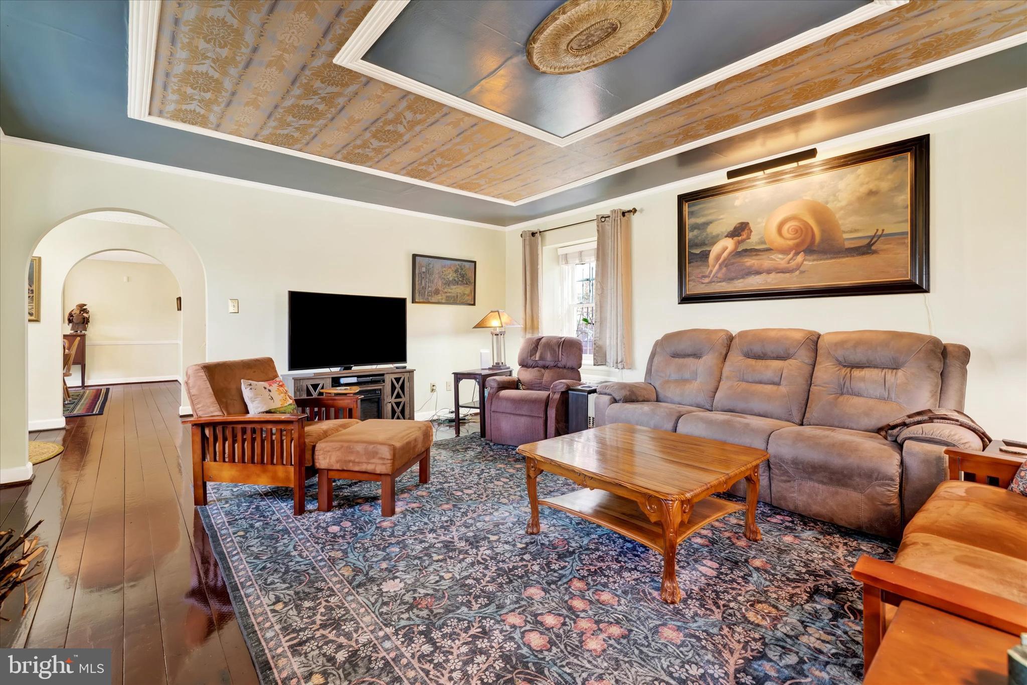 1711 Alsace Road Reading, PA 19604 - Photo 5 of 45 a living room with furniture a rug and a flat screen tv
