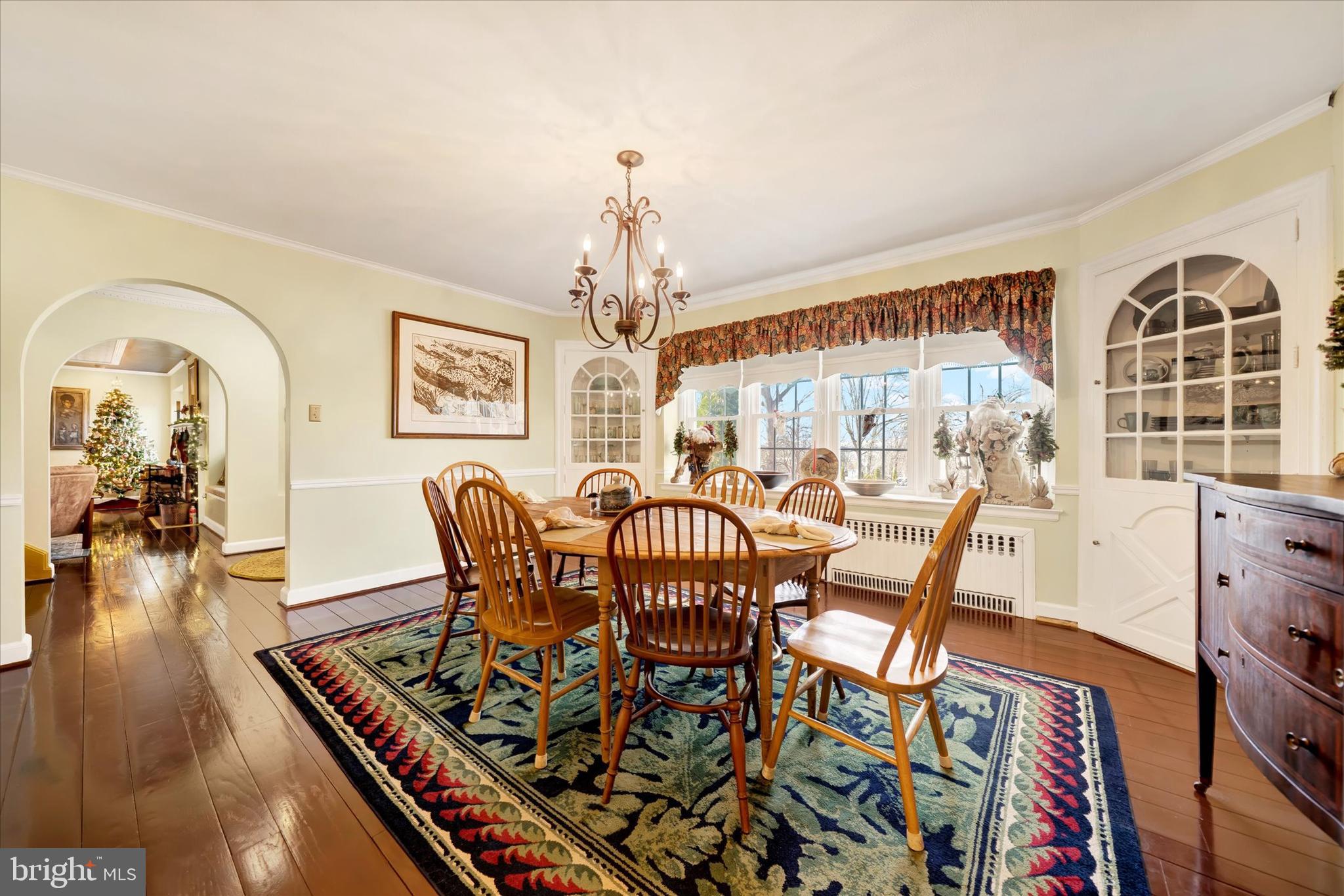 1711 Alsace Road Reading, PA 19604 - Photo 10 of 45 a view of a dining room with furniture a chandelier and wooden floor