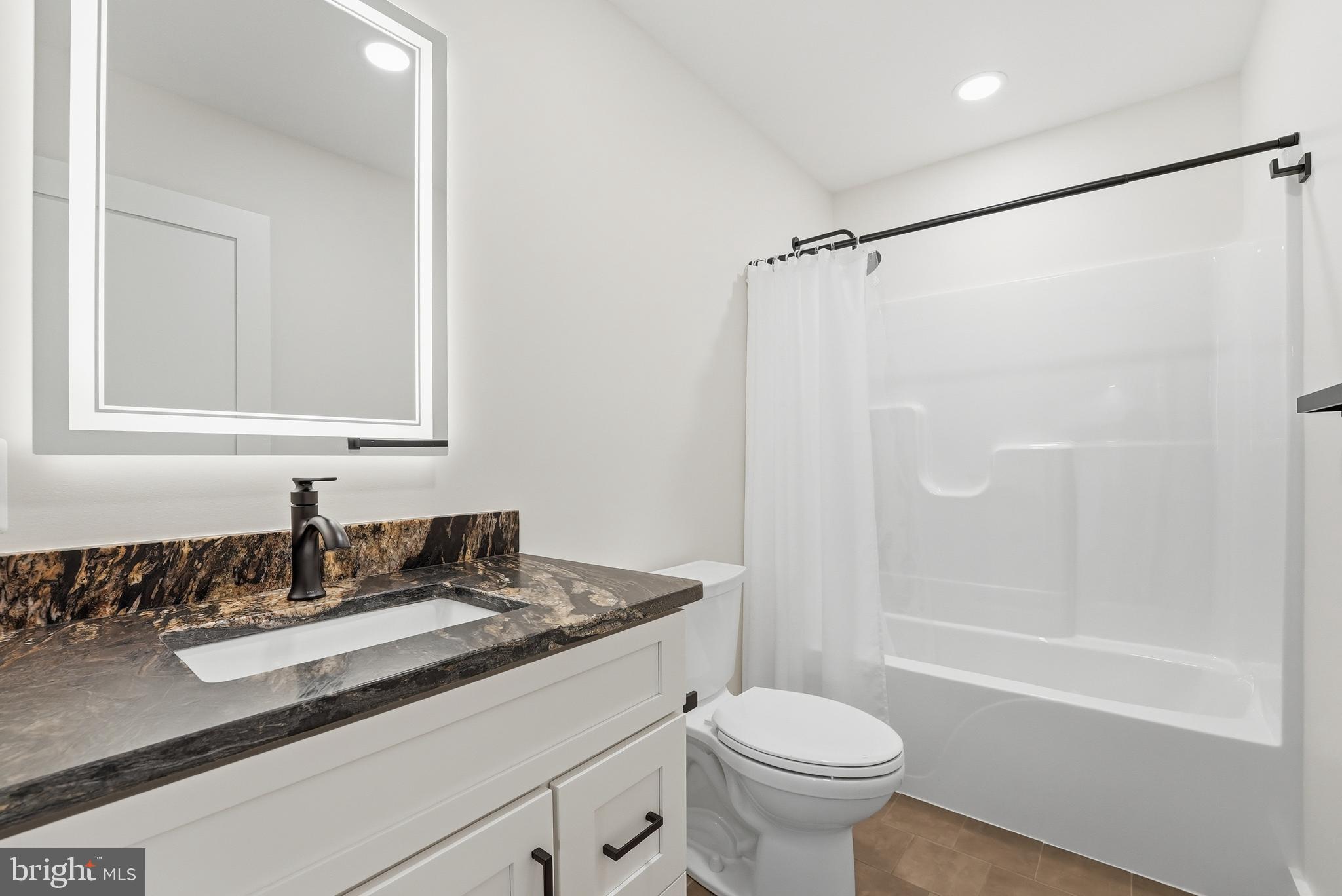1548 James City Road Reva, VA 22735 - Photo 21 of 48 a bathroom with a sink and a mirror
