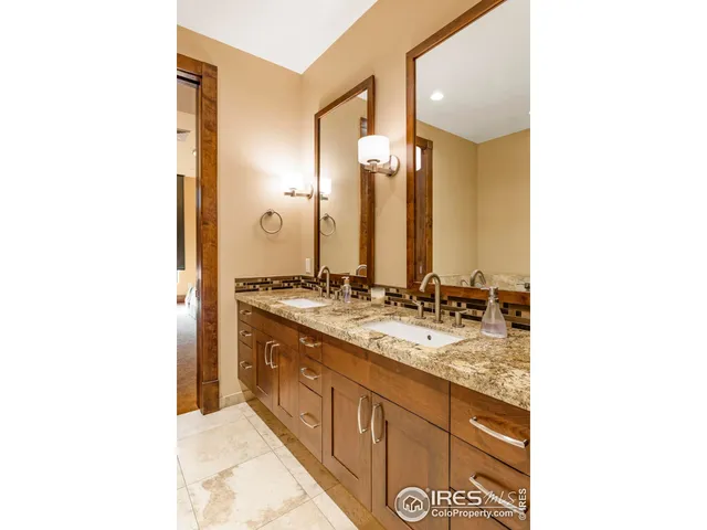 a bath tub sitting in a bathroom next to a white wall