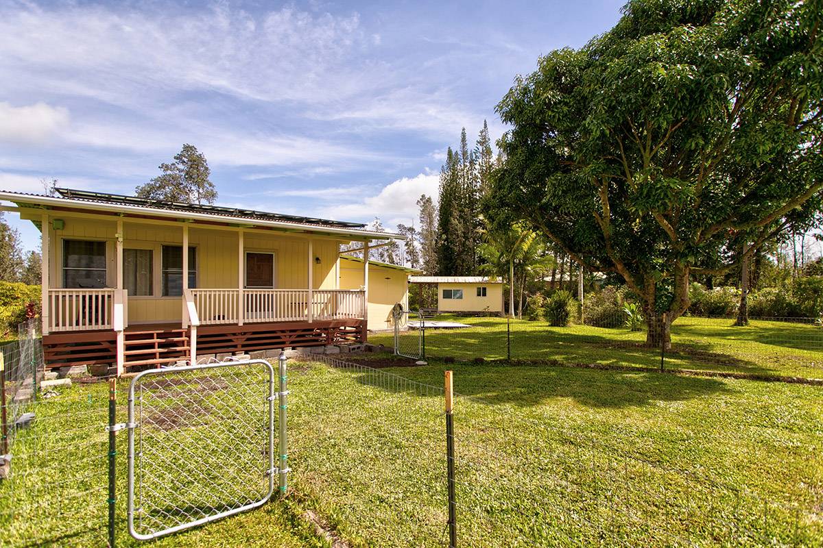 16-2041 Opeapea Road Pahoa, HI 96778 - Photo 1 of 26 a view of a house with swimming pool