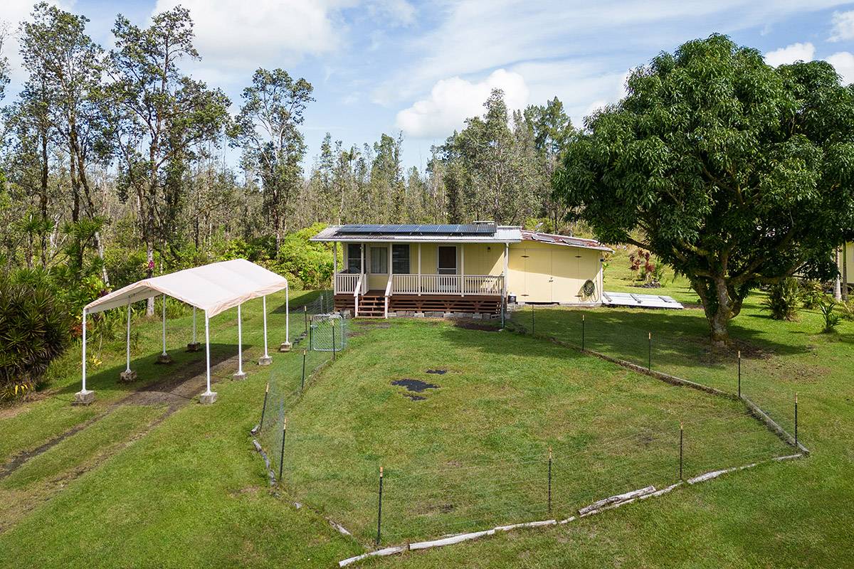 16-2041 Opeapea Road Pahoa, HI 96778 - Photo 2 of 26 a view of a house with a yard