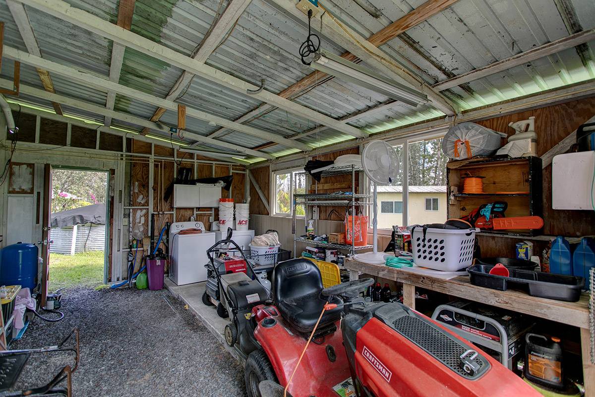 16-2041 Opeapea Road Pahoa, HI 96778 - Photo 23 of 26 a storage room with washer and dryer