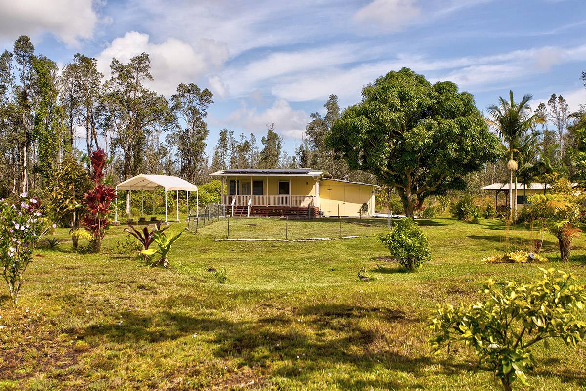 16-2041 Opeapea Road Pahoa, HI 96778 - Photo 4 of 26 a swimming pool with outdoor seating and yard