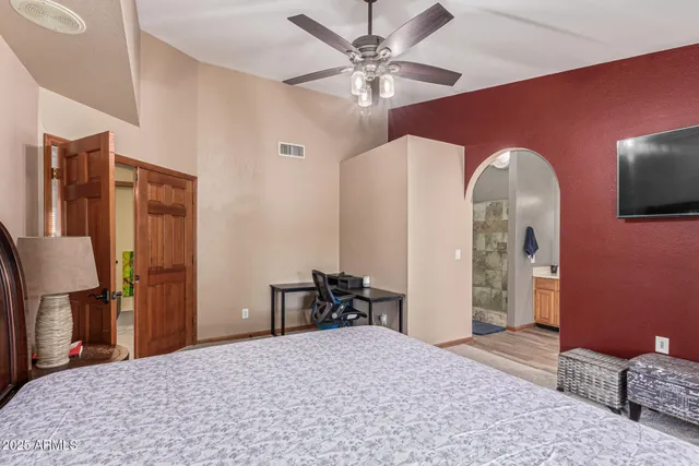 a bathroom with a shower and a sink
