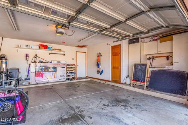 a view of a swimming pool with a lounge chairs