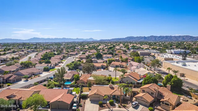 a view of a house with a outdoor space and sitting area