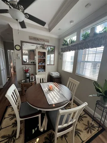 a outdoor dining space with furniture and window