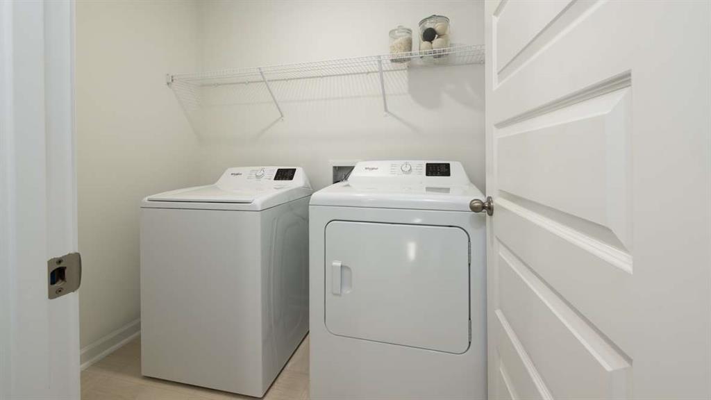 691 Alburgh Alley Mableton, GA 30126 - Photo 22 of 37 a utility room with dryer and washer