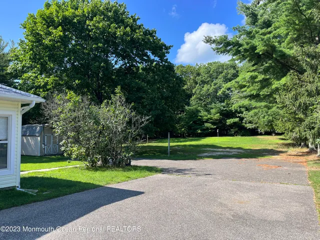 a view of a house with a big yard