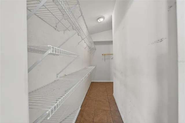 a bathroom with a double vanity sink mirror and toilet