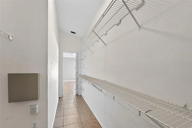a kitchen with a sink a stove and cabinets