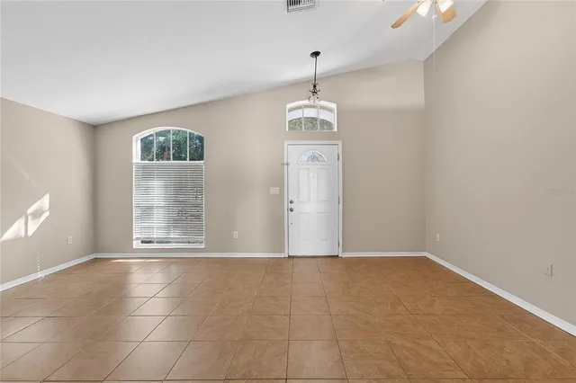 a view of a big room with carpet