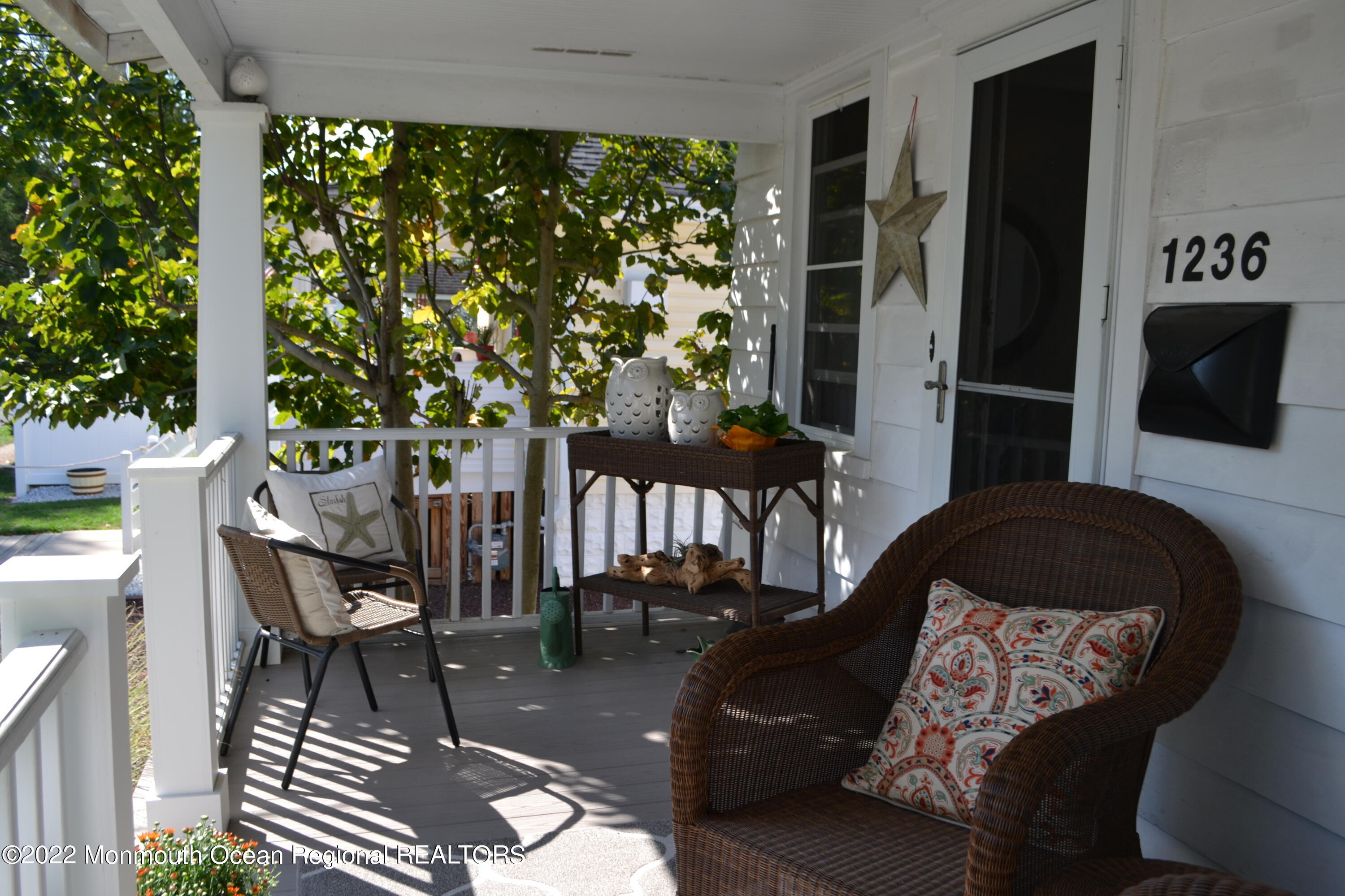1236 Maplewood Road Belmar, NJ 07719 - Photo 1 of 38 a balcony view with a outdoor seating space