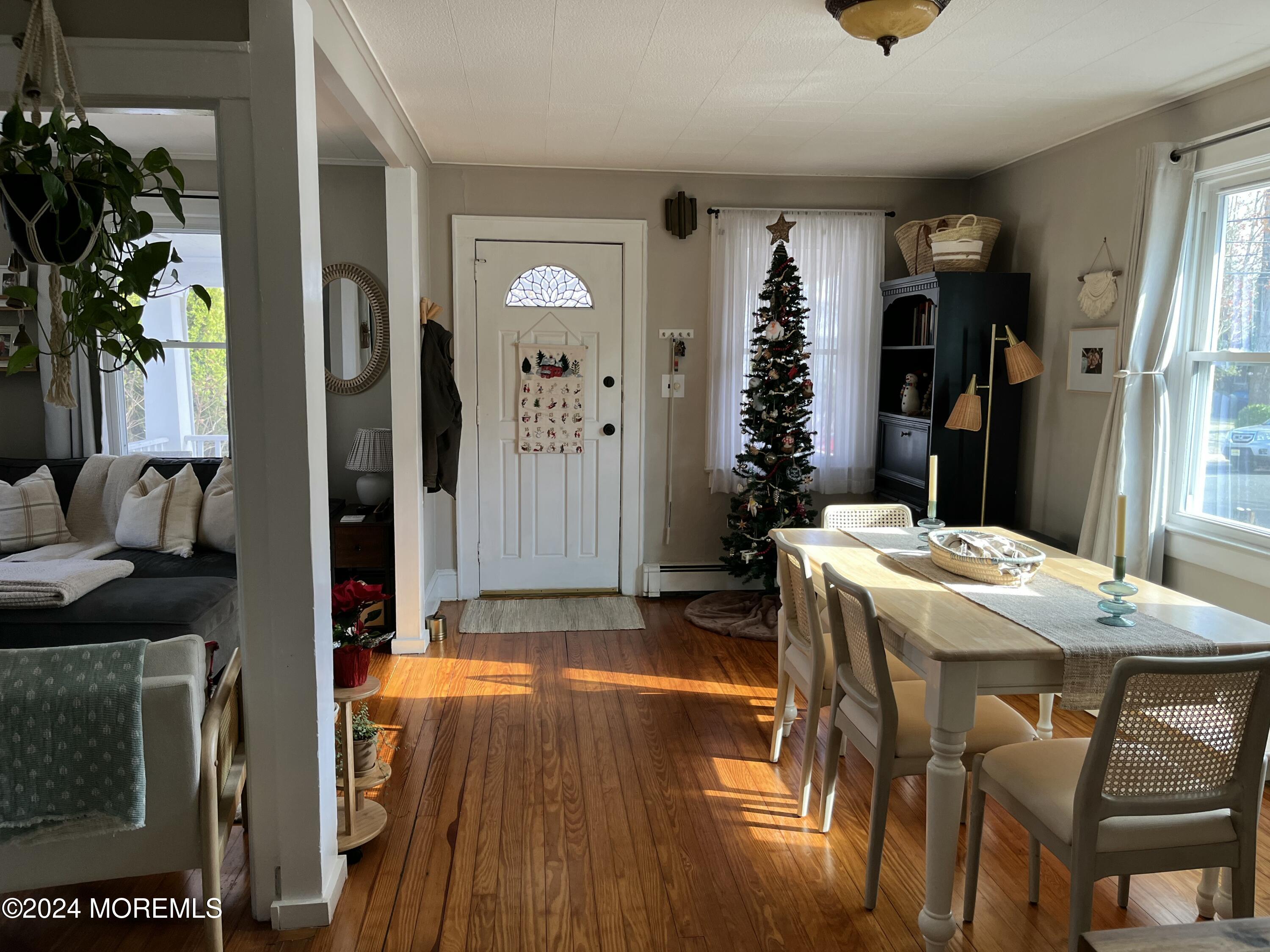 1236 Maplewood Road Belmar, NJ 07719 - Photo 15 of 38 a dining room with furniture and window